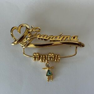 Vintage Gold Tone Grandma Brooch with girl charm